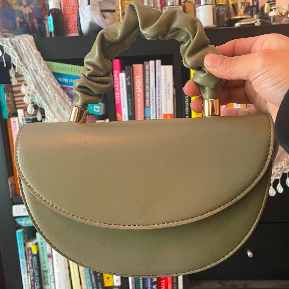 Small olive green clutch bag with detachable strap NWT